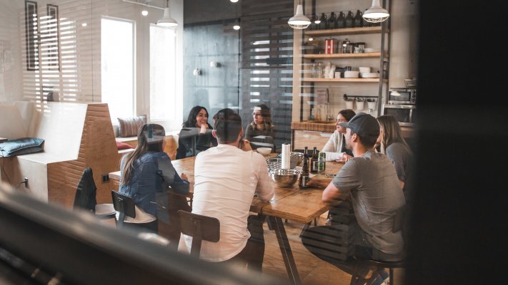 a marketing team having a meeting in a coffee lounge